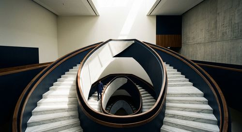 Minimalist infinite loop staircase symbolizing the debt trap